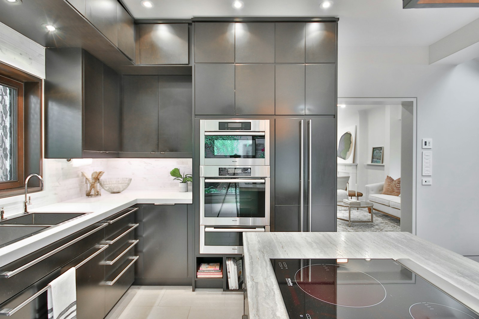 Built-in stainless appliances in a modern Weston, MA kitchen